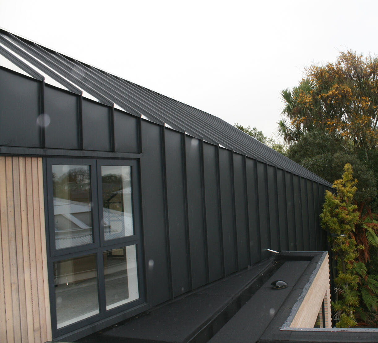 Roofing Design and Quality Control Photograph showing roofing design and quality control in action